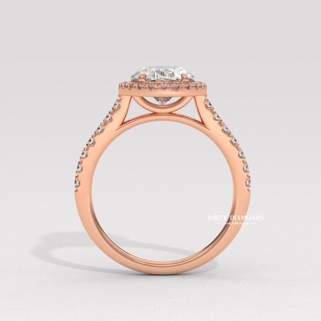 Oval halo diamond engagement ring available in multiple metals