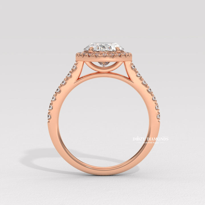 Oval halo diamond engagement ring available in multiple metals