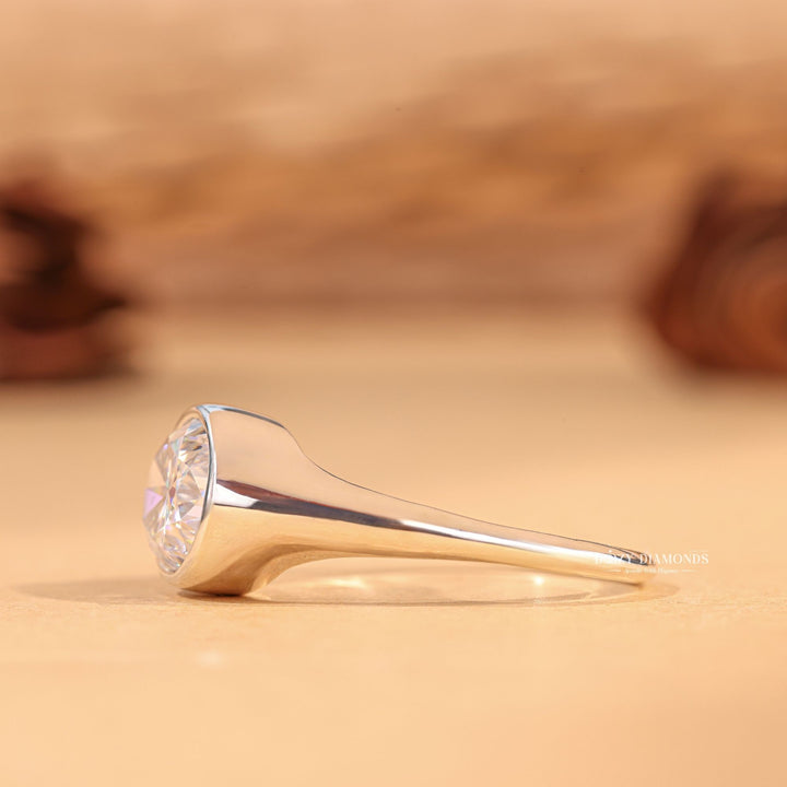 Oval cut diamond ring worn on hand