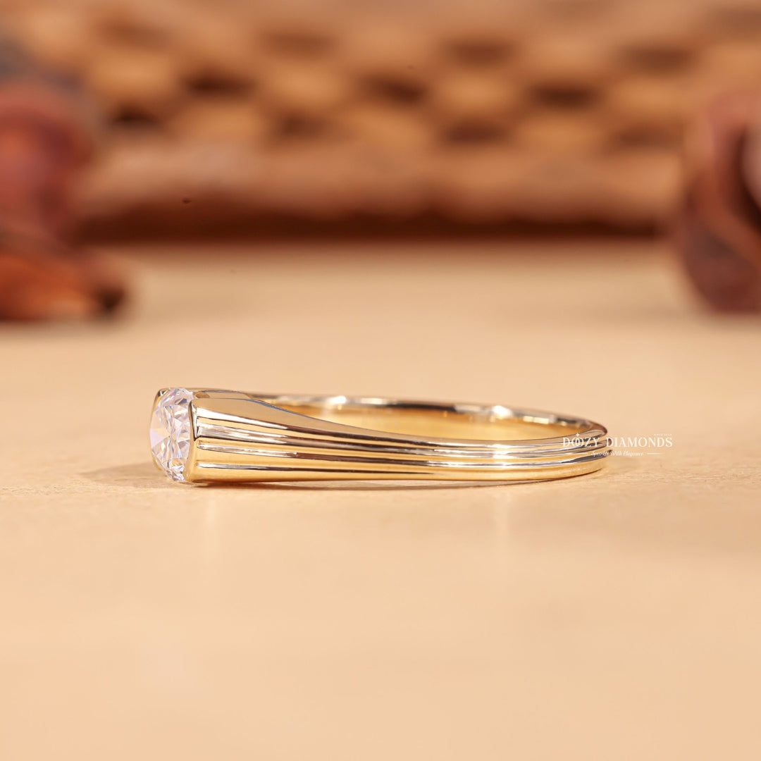 Lifestyle shot of oval east west diamond ring on hand