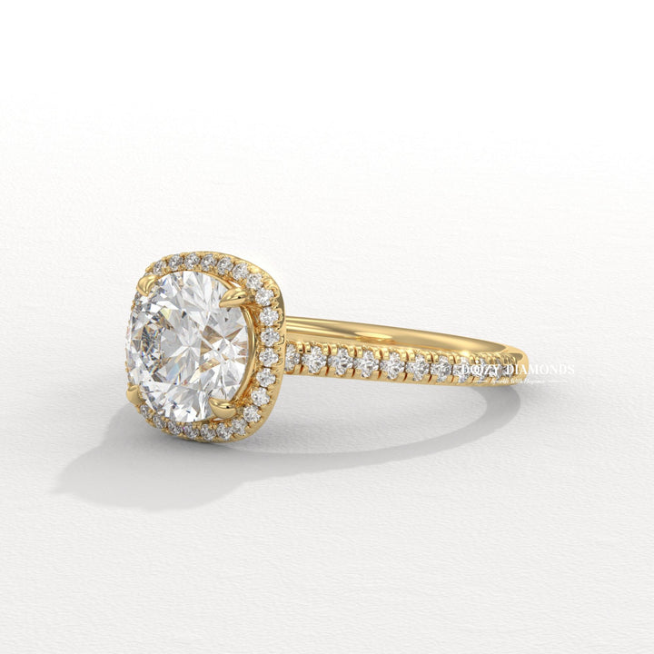 Detailed close-up of round halo diamond engagement ring