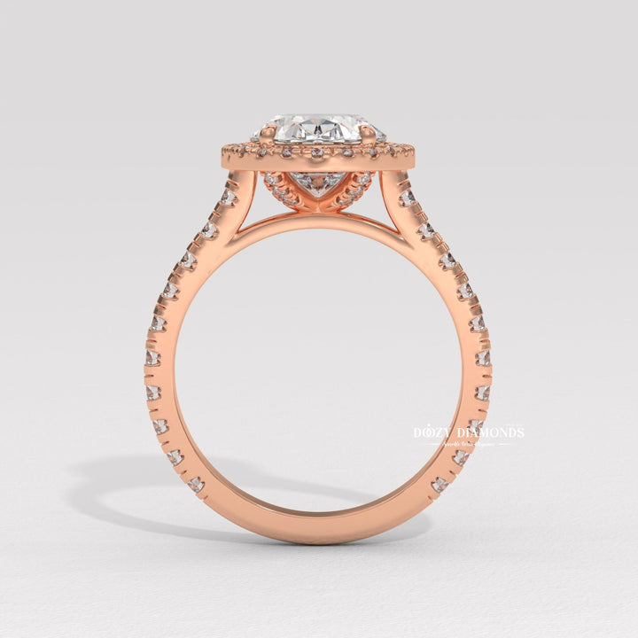 Oval halo engagement ring photographed in natural light