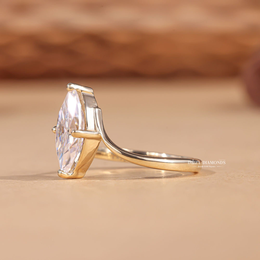 Unboxing view of marquise cut solitaire diamond engagement ring