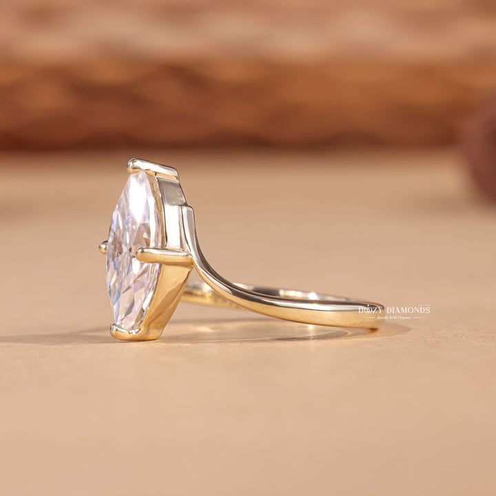 Unboxing view of marquise cut solitaire diamond engagement ring