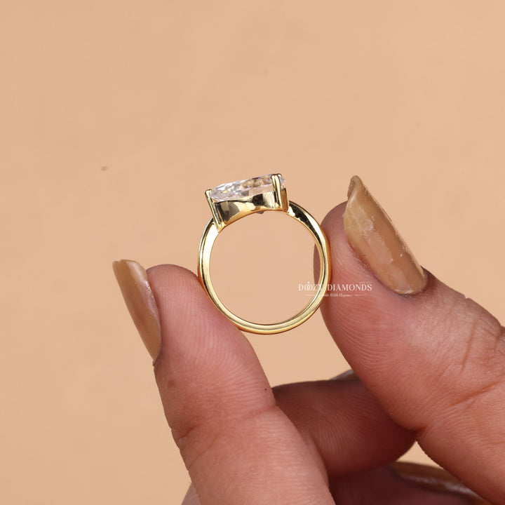 Pear dome engagement ring with certified lab grown diamond