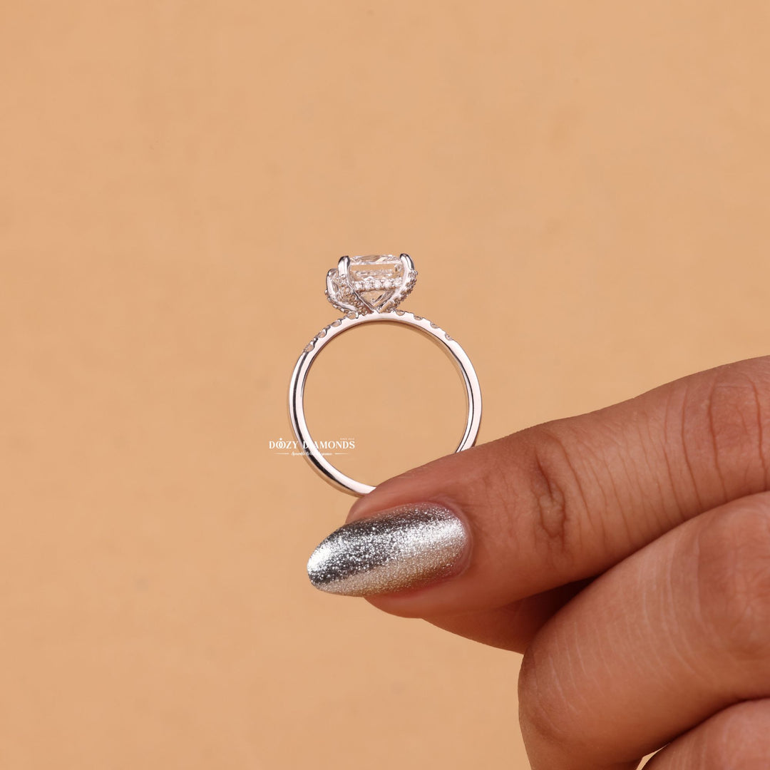 Unboxing view of princess cut hidden halo diamond engagement ring