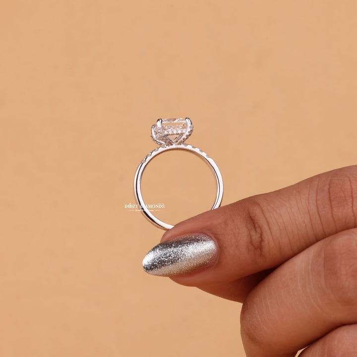 Unboxing view of princess cut hidden halo diamond engagement ring