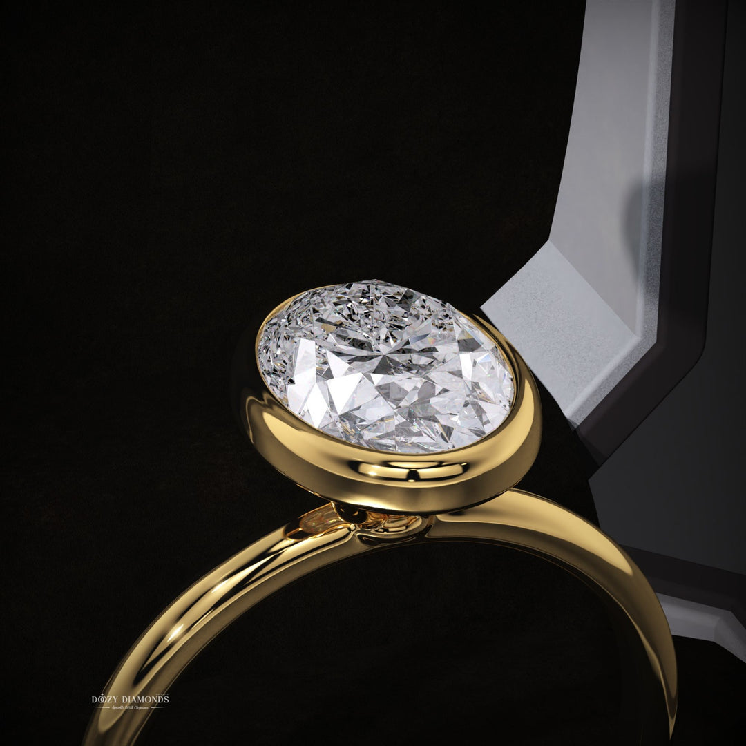 IGI certified oval cut diamond in bezel engagement ring setting