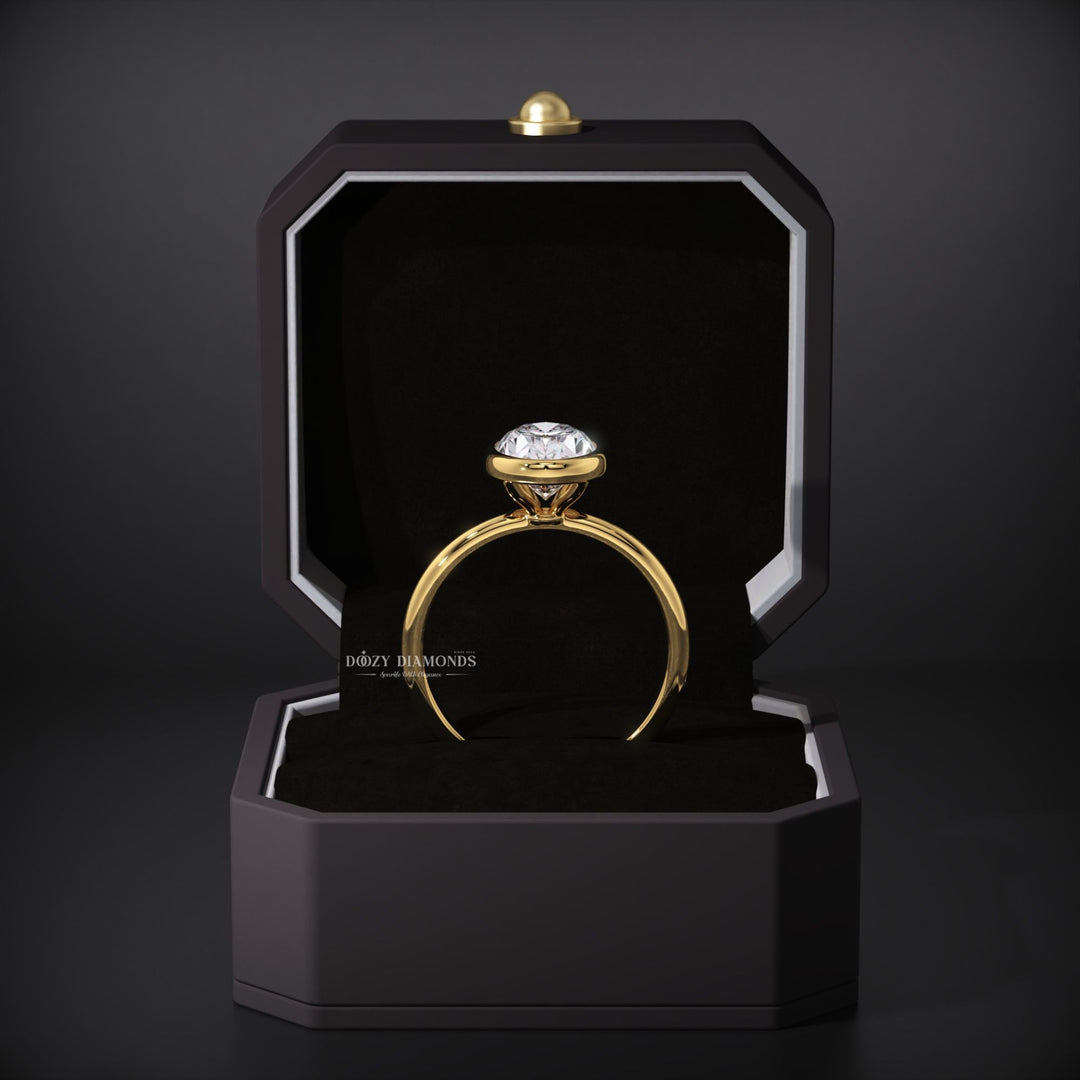 Lifestyle shot of oval bezel diamond ring on hand