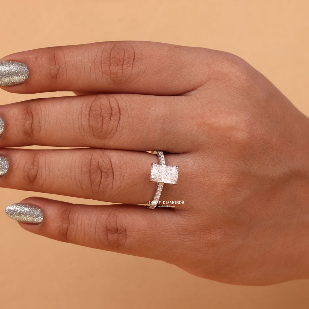 Close-up of radiant cut center diamond in hidden halo engagement ring