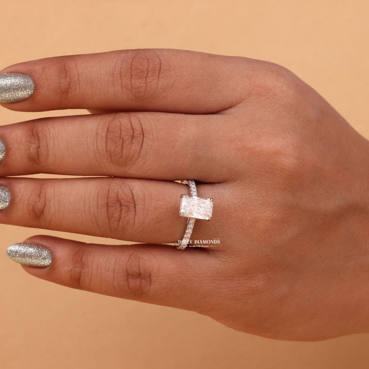 Close-up of radiant cut center diamond in hidden halo engagement ring