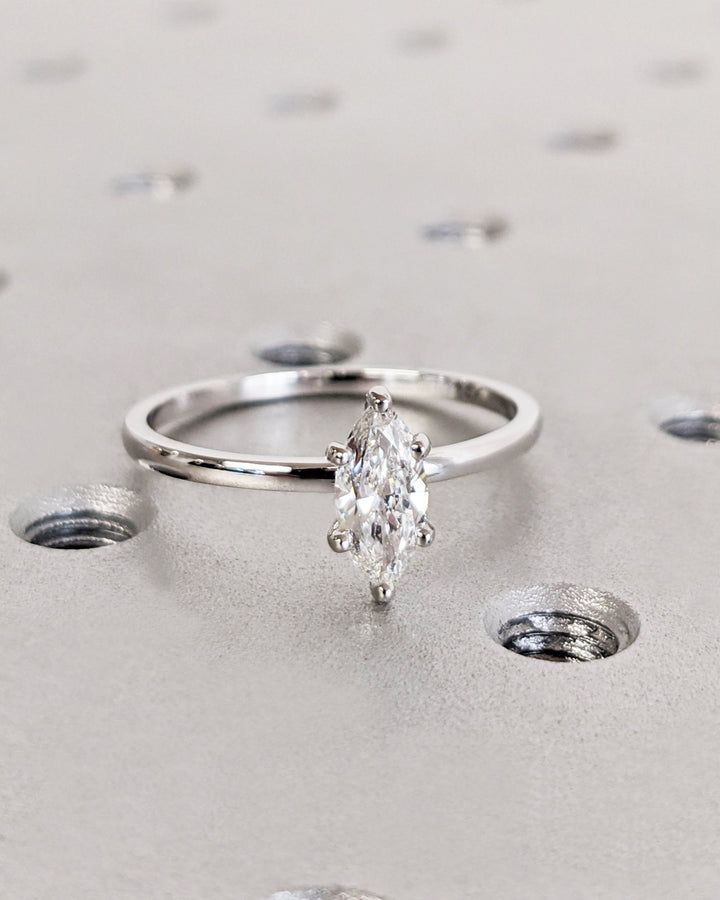 Marquise solitaire engagement ring viewed from the side