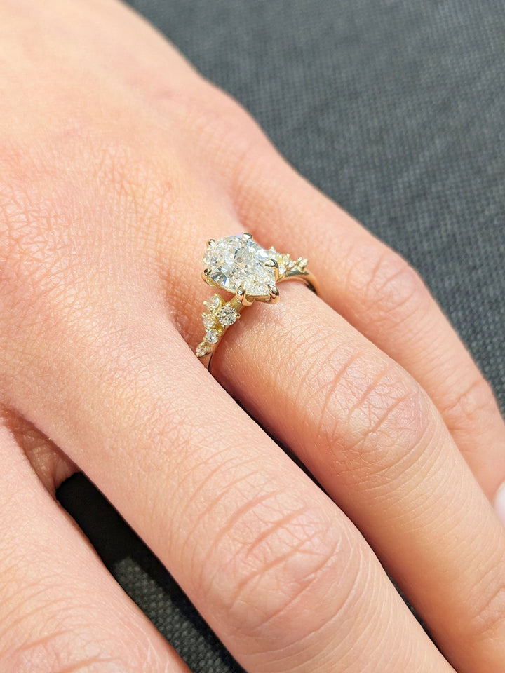 Classic pear cluster engagement ring crafted for everyday wear