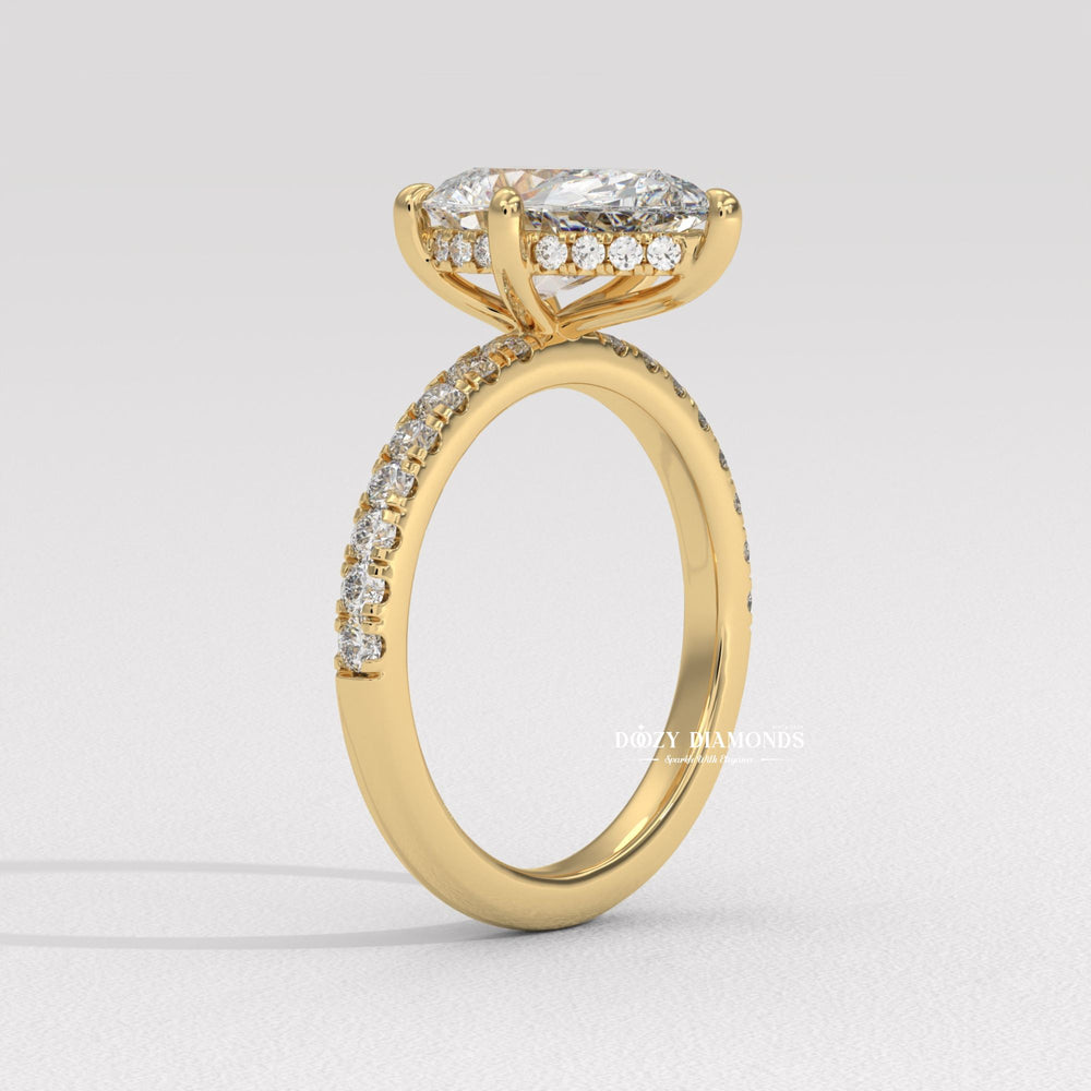 Top-down view of pear cut solitaire engagement ring