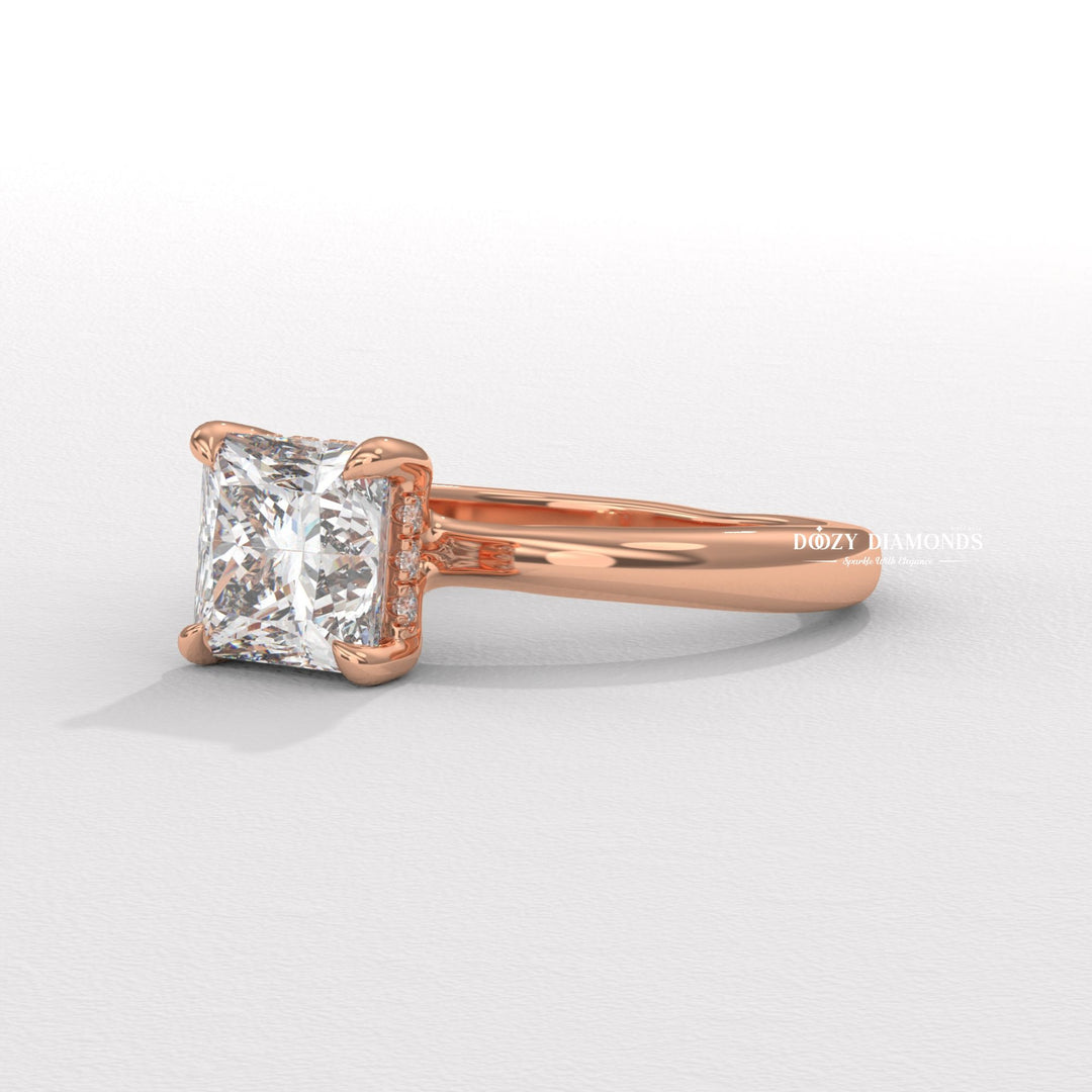 Princess solitaire ring set with an IGI graded diamond