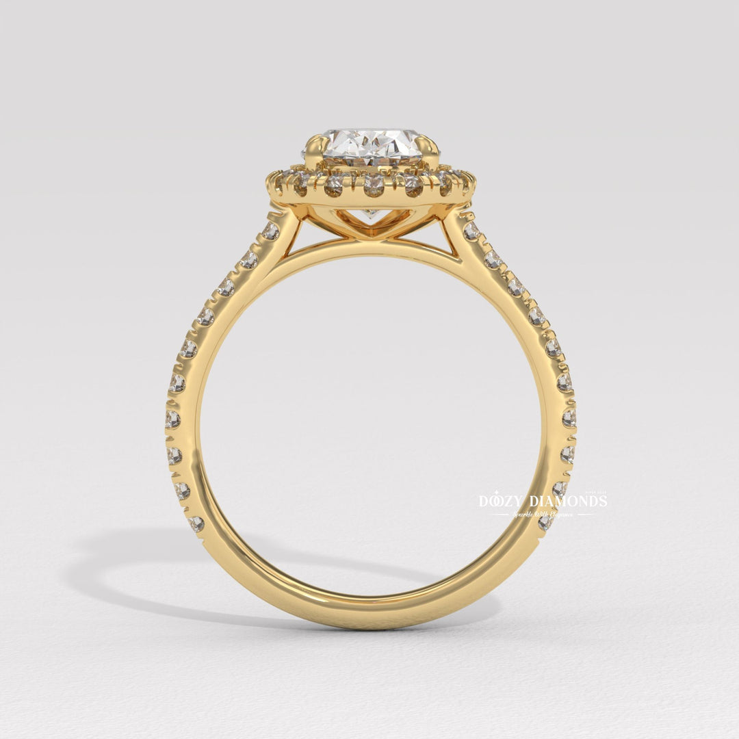 Oval halo engagement ring viewed from the side