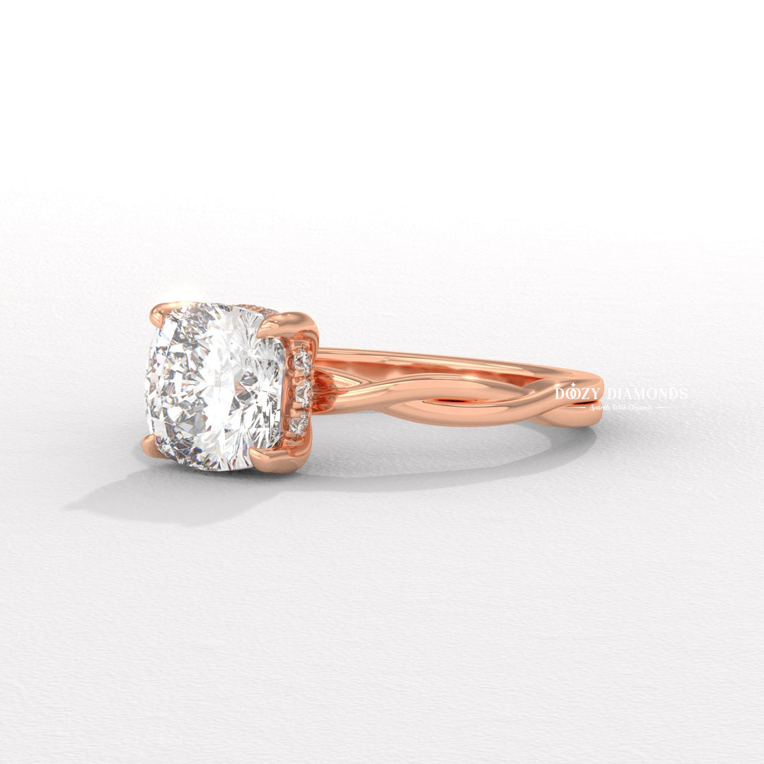 Cushion solitaire engagement ring viewed from the side