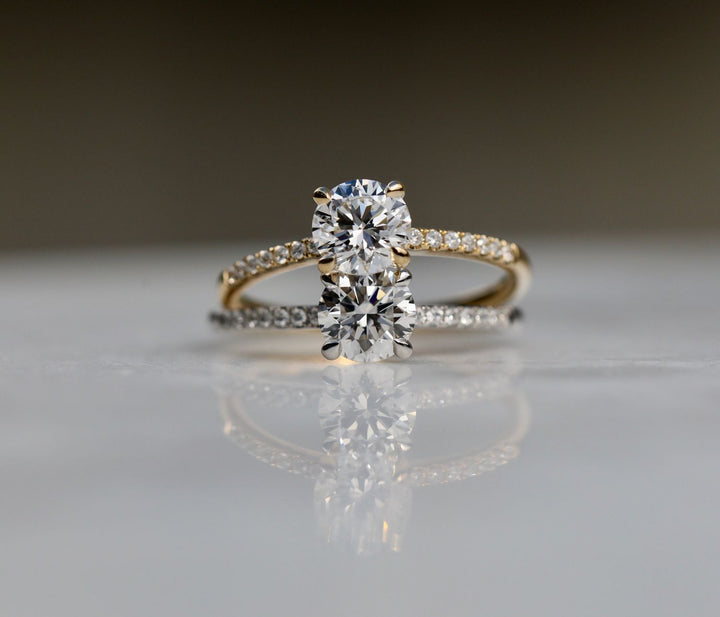 Round cut engagement ring side view showing band detail