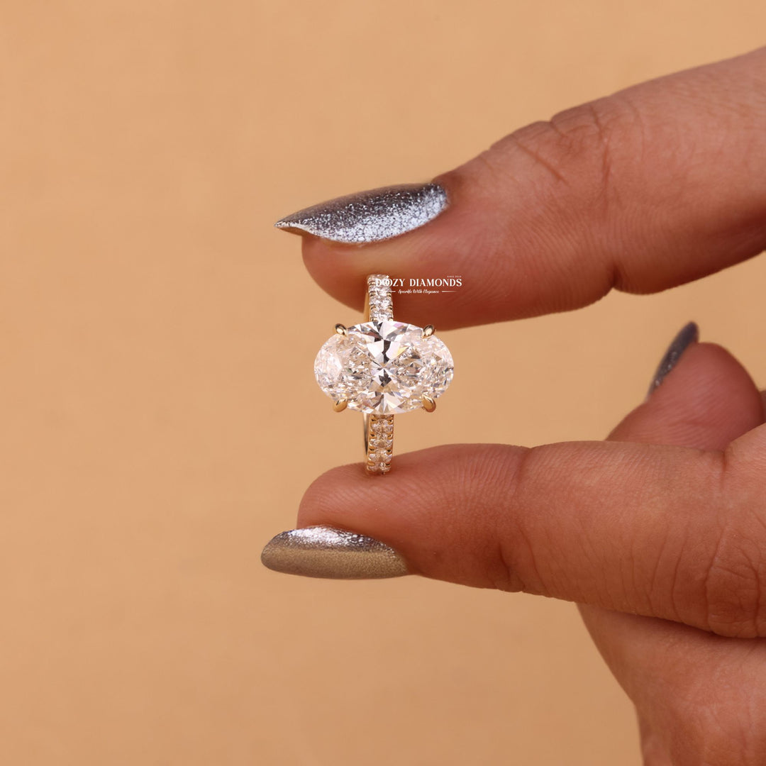 Oval hidden halo lab grown diamond ring side profile in gold setting