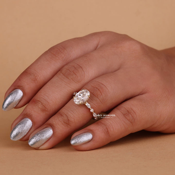 Detailed close-up of oval hidden halo diamond engagement ring