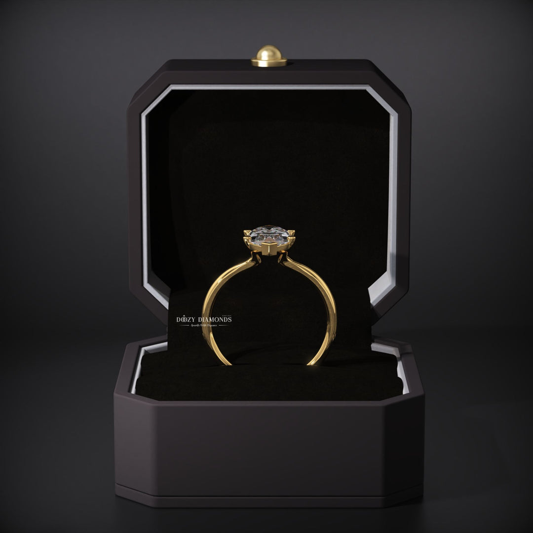 Marquise solitaire engagement ring offered in gold and platinum