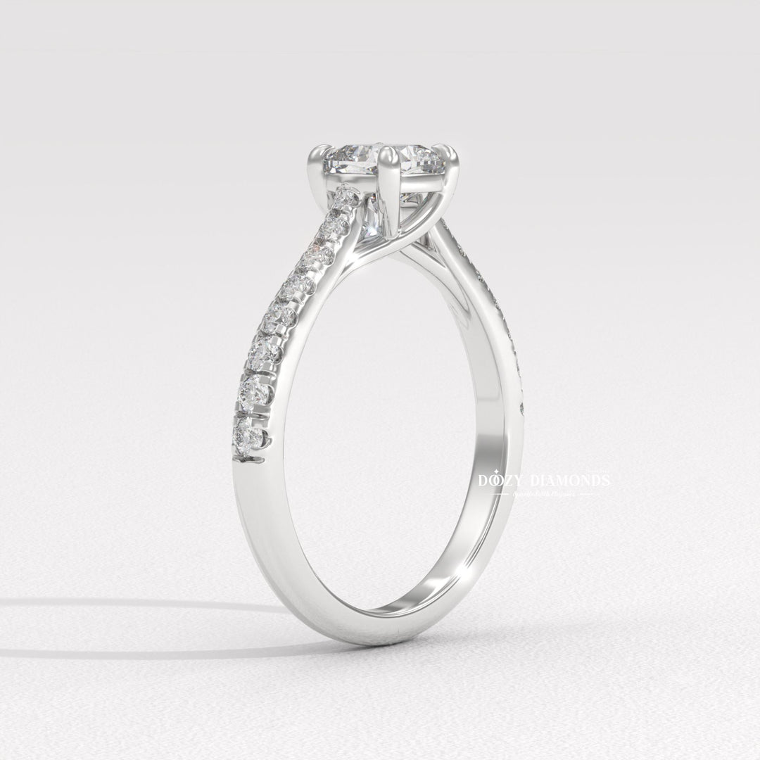 Cushion solitaire engagement ring shown on hand for true-to-life sizing