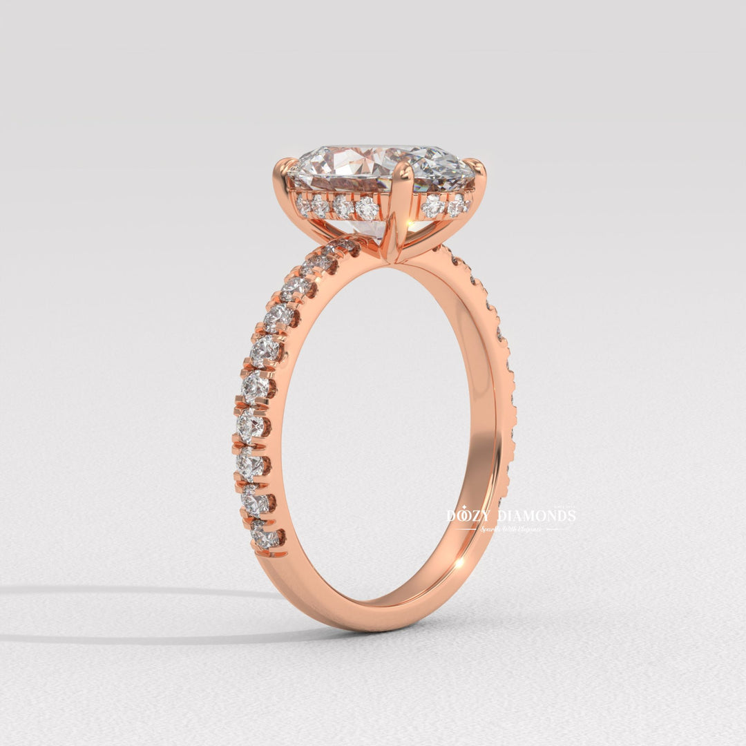 Oval cut diamond ring worn on hand
