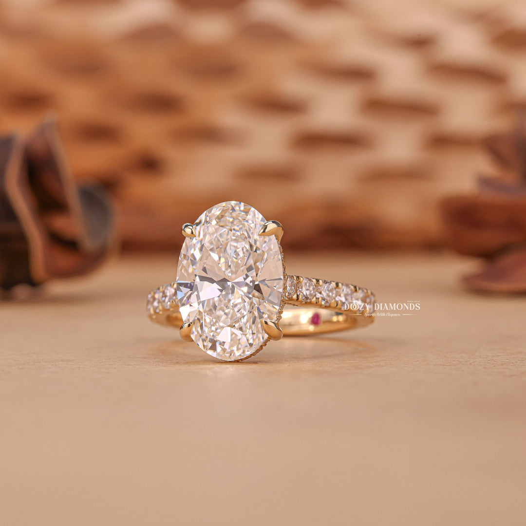 Side angle of oval hidden halo diamond engagement ring