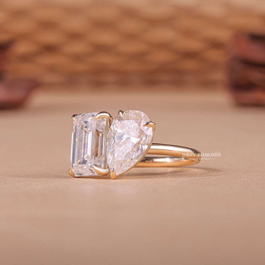 Lifestyle shot of pear solitaire diamond ring on hand