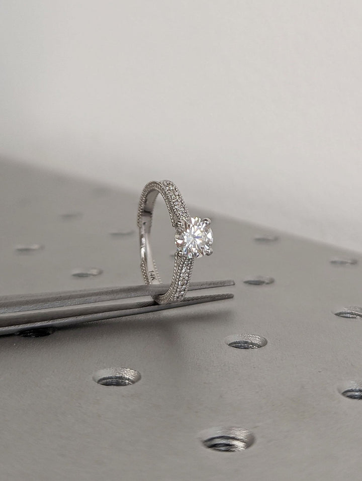 Shop the round cut vintage engagement ring collection online
