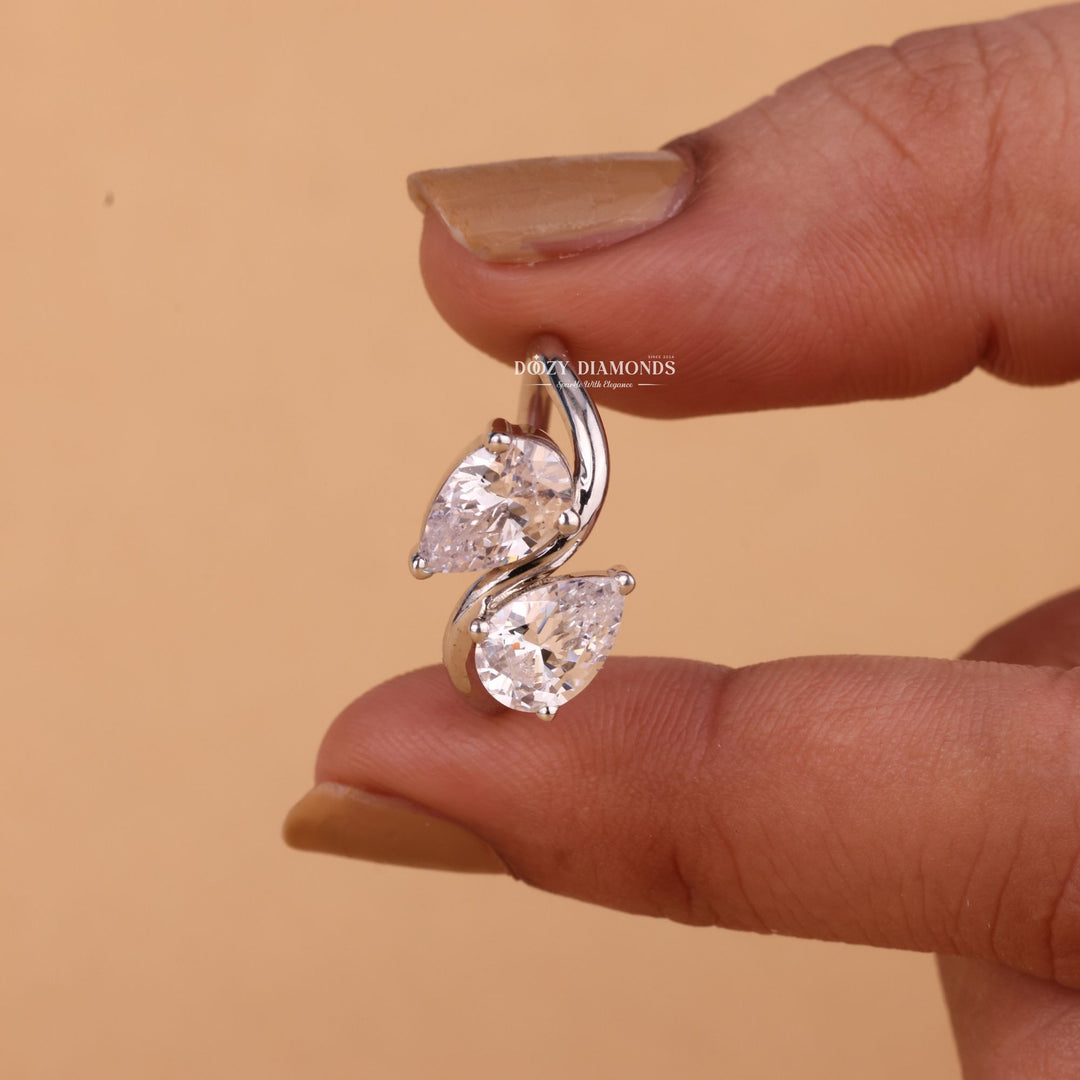Pear solitaire engagement ring viewed from the side