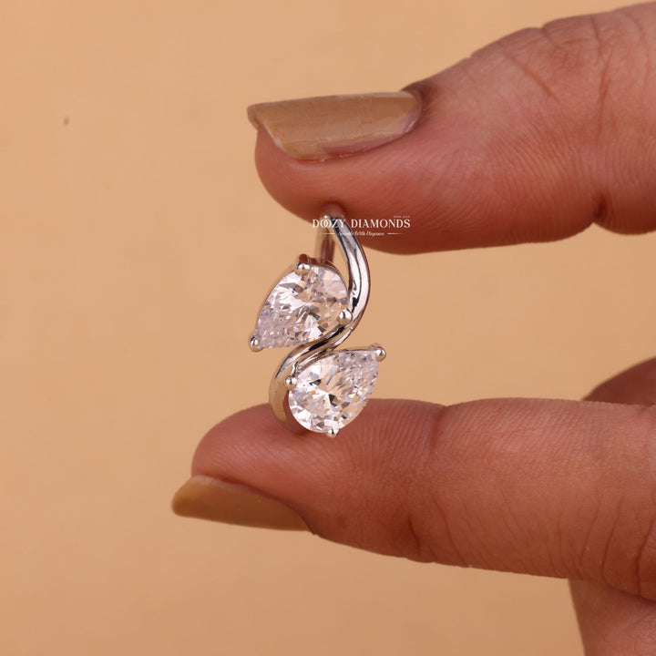 Pear solitaire engagement ring viewed from the side