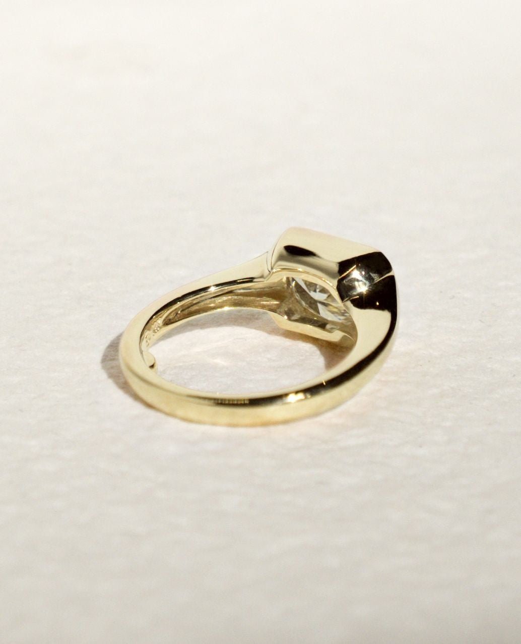 Radiant bezel lab grown diamond ring side profile in gold setting
