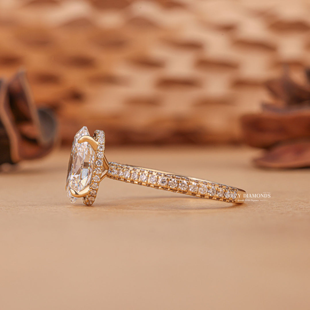 Oval hidden halo ring set with an IGI graded diamond