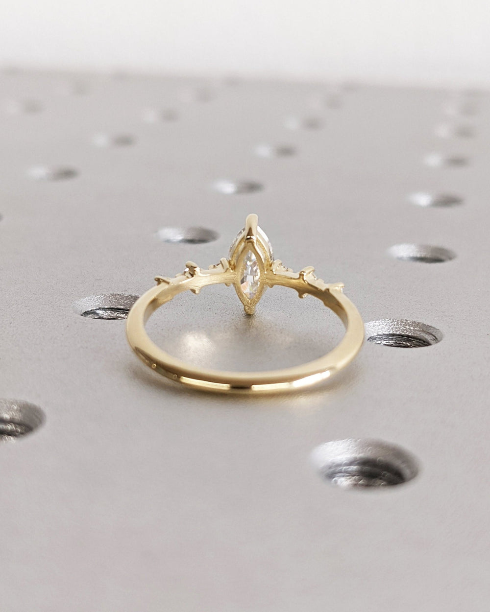 Marquise pave engagement ring photographed in natural light