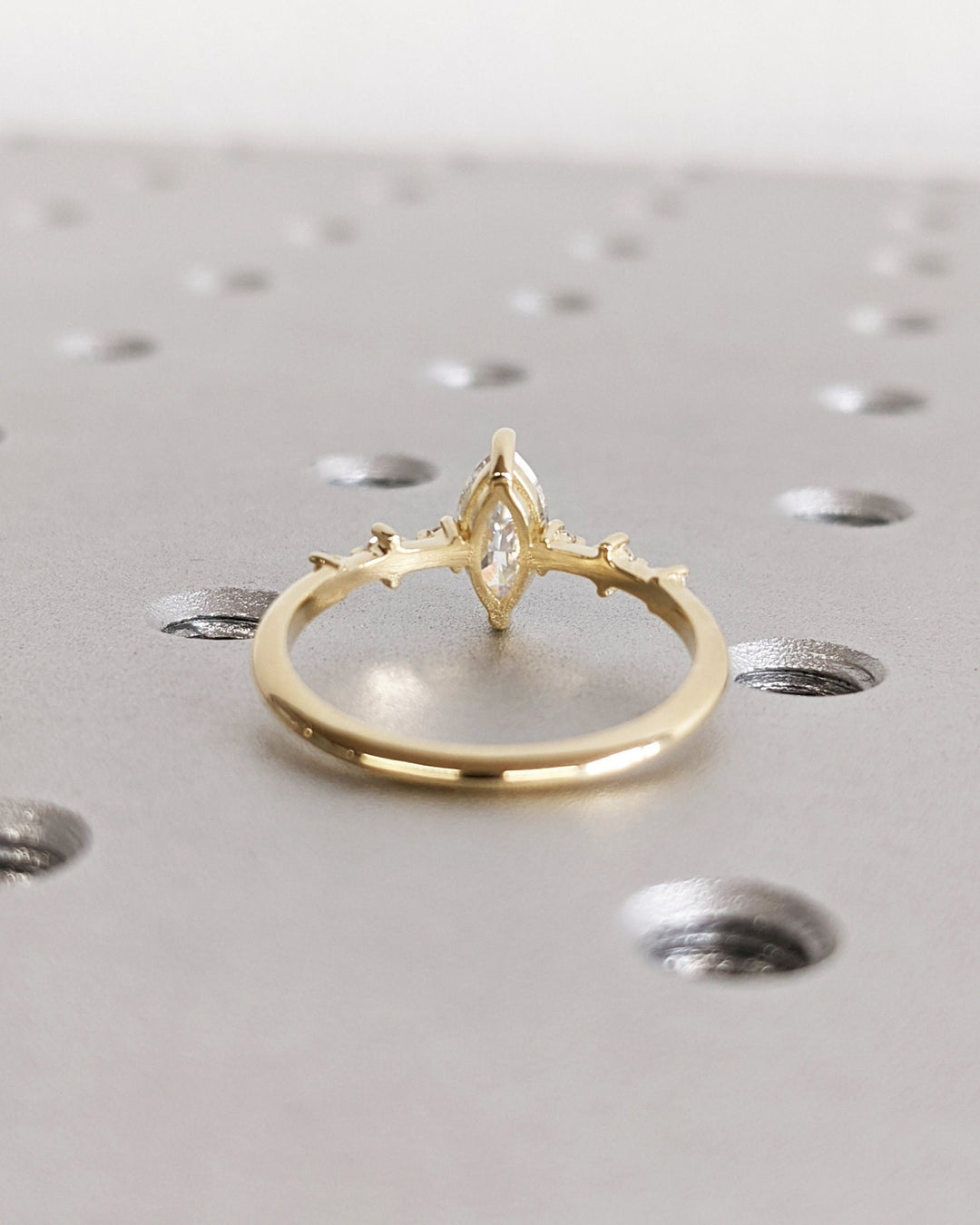 Marquise pave engagement ring photographed in natural light