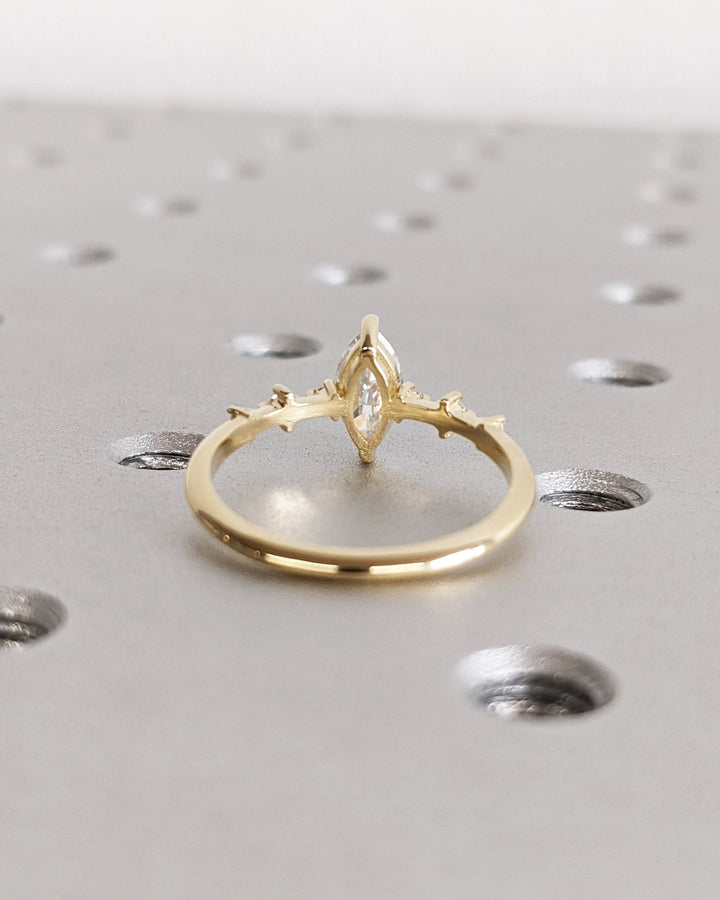 Marquise pave engagement ring photographed in natural light