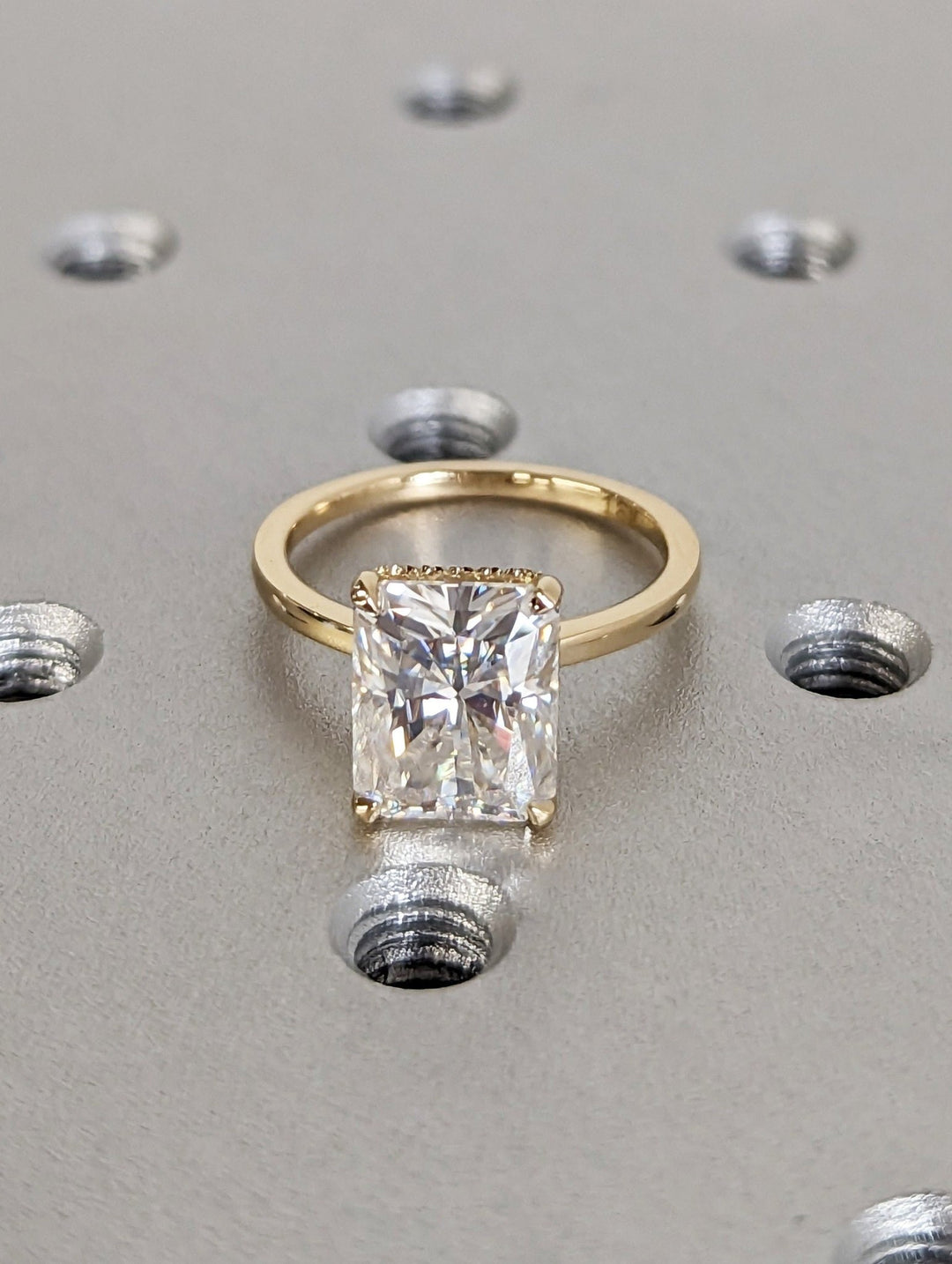 Radiant hidden halo engagement ring with IGI certificate and packaging