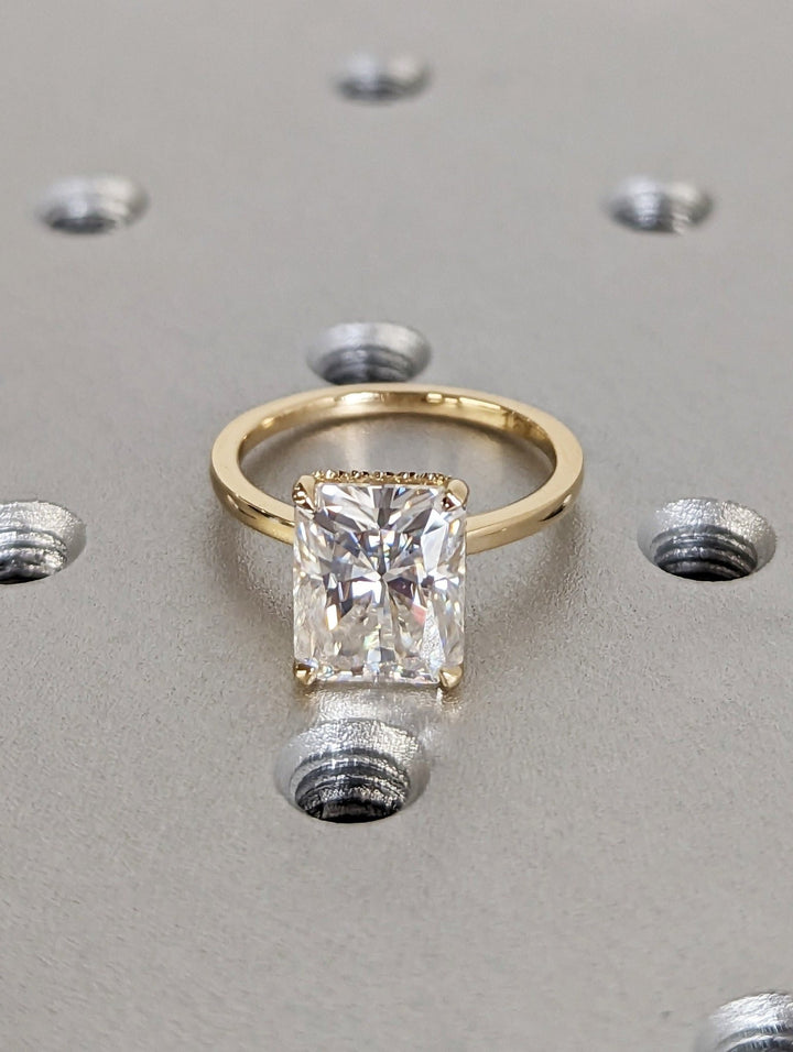 Radiant hidden halo engagement ring with IGI certificate and packaging