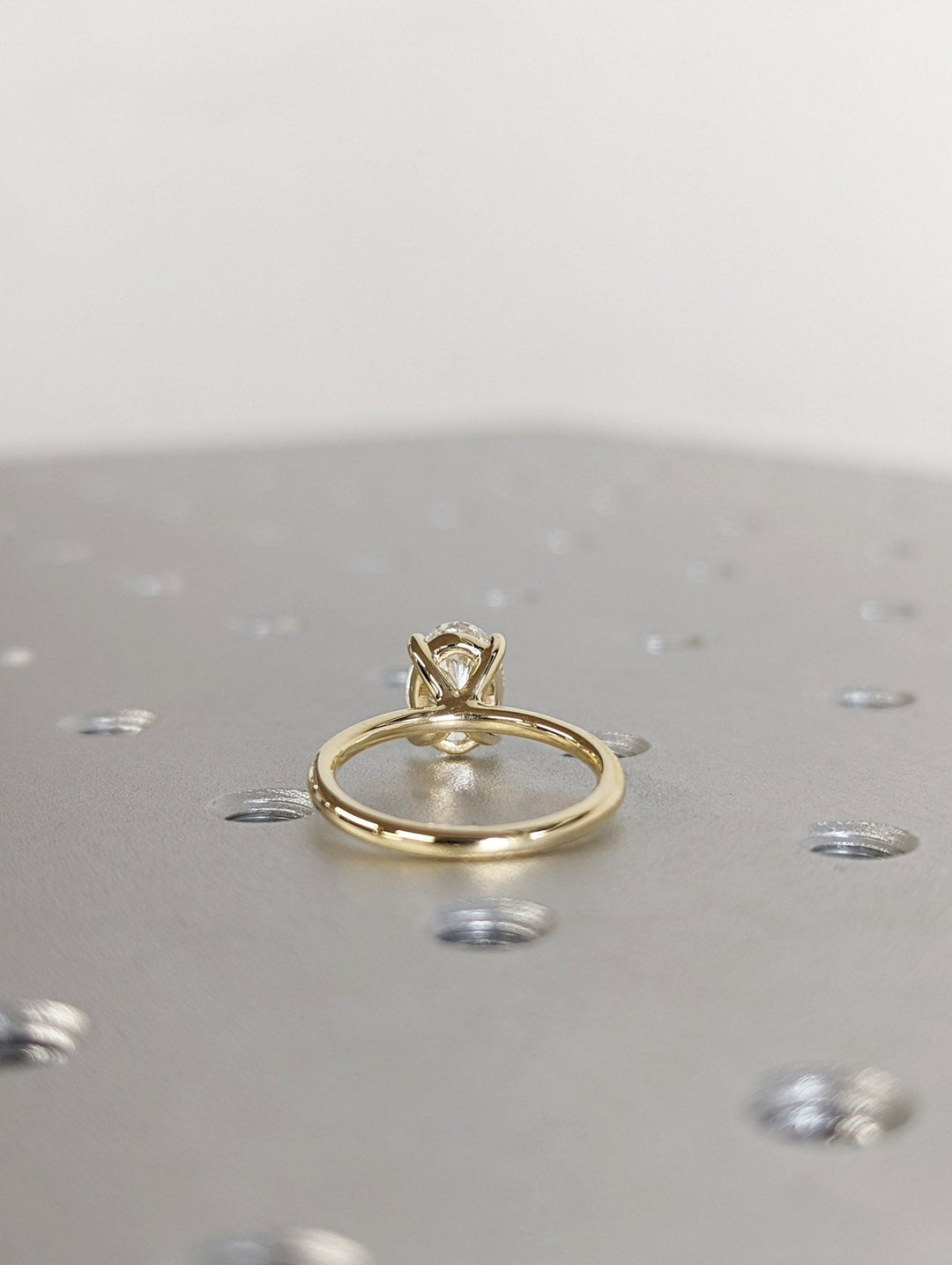 Oval solitaire engagement ring with certified lab grown diamond