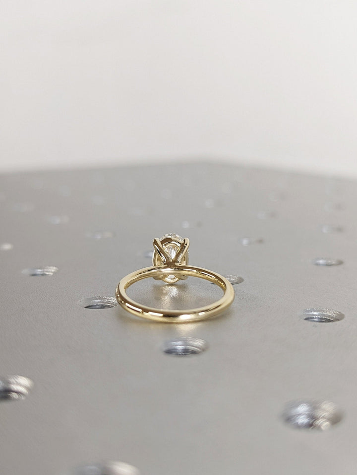Oval solitaire engagement ring with certified lab grown diamond
