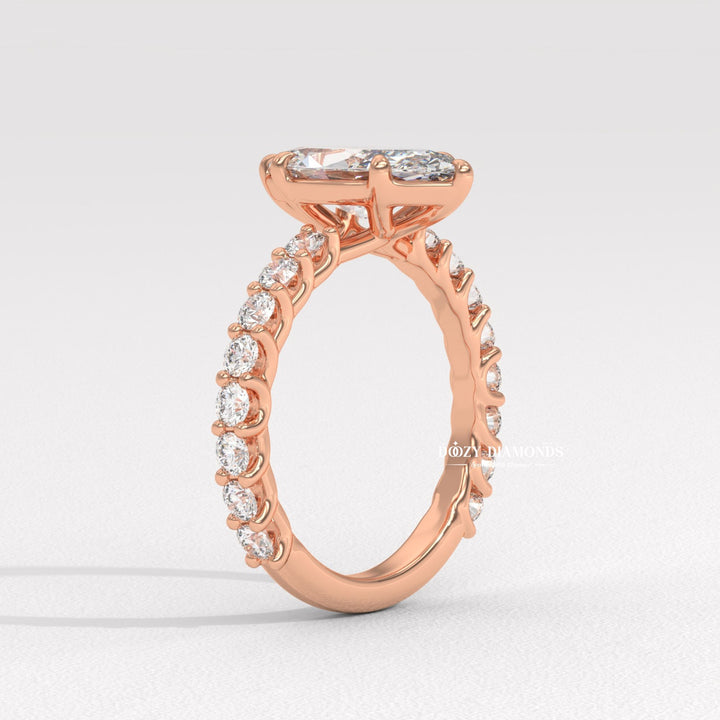 Marquise cut solitaire engagement ring shown in real-life wear