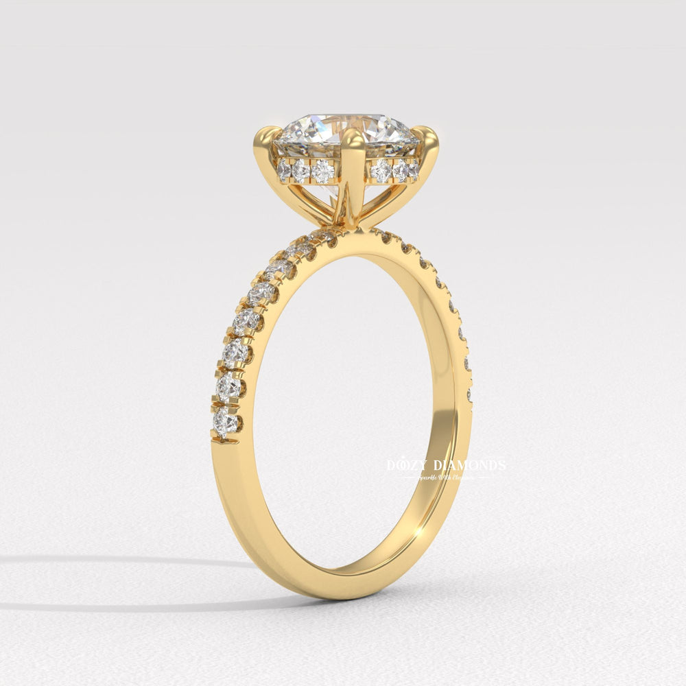 Round hidden halo engagement ring photographed in natural light