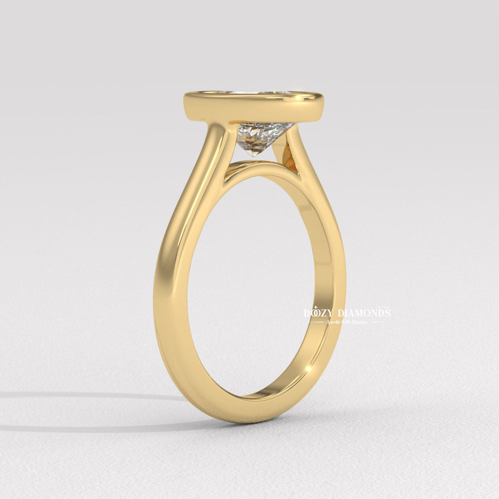 Oval bezel engagement ring close-up highlighting diamond sparkle