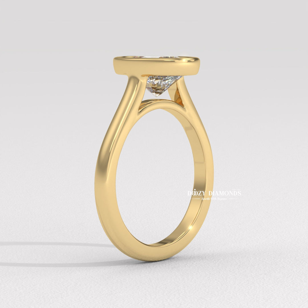 Oval bezel engagement ring close-up highlighting diamond sparkle