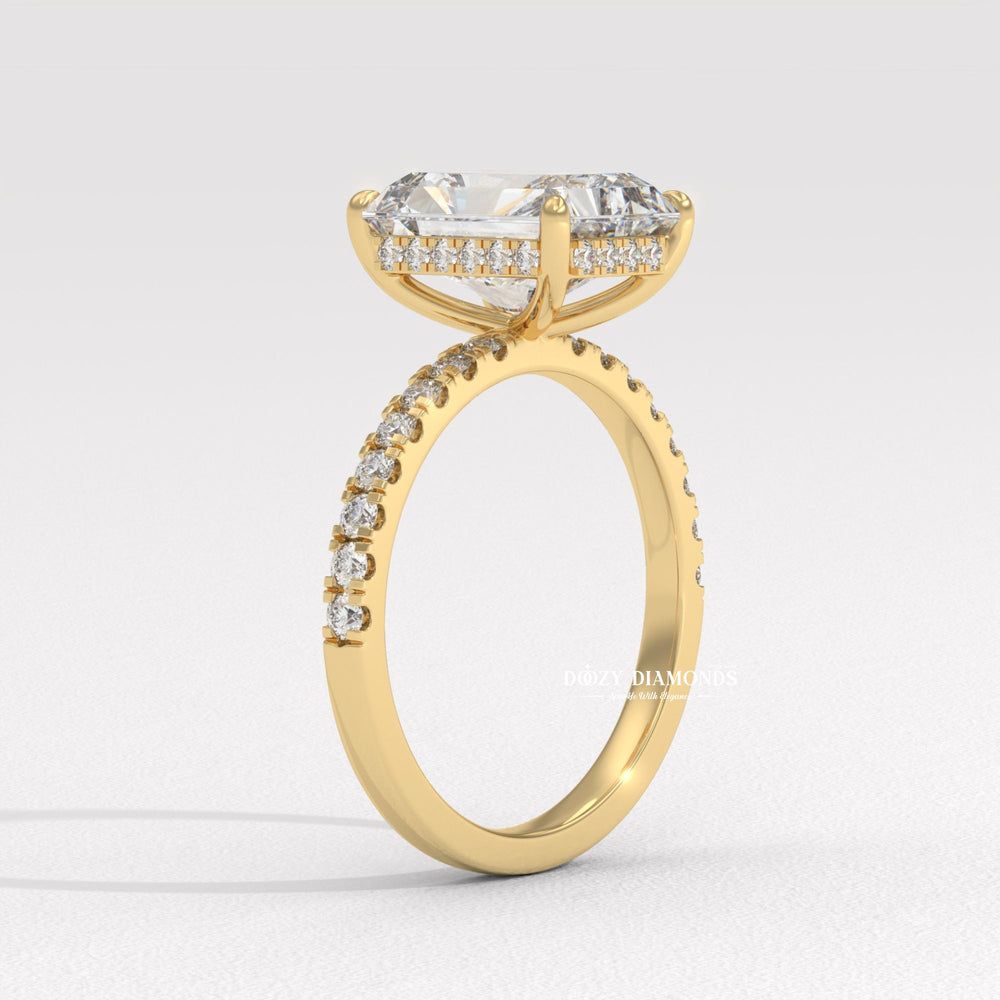 Angled view of radiant cut diamond in hidden halo setting