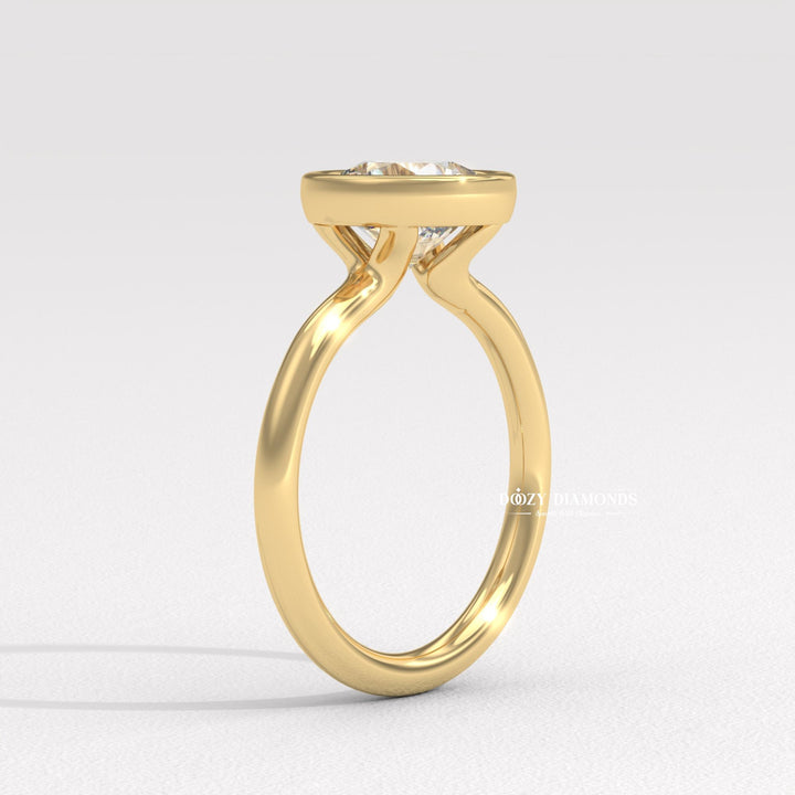 IGI certified round cut diamond in bezel engagement ring setting