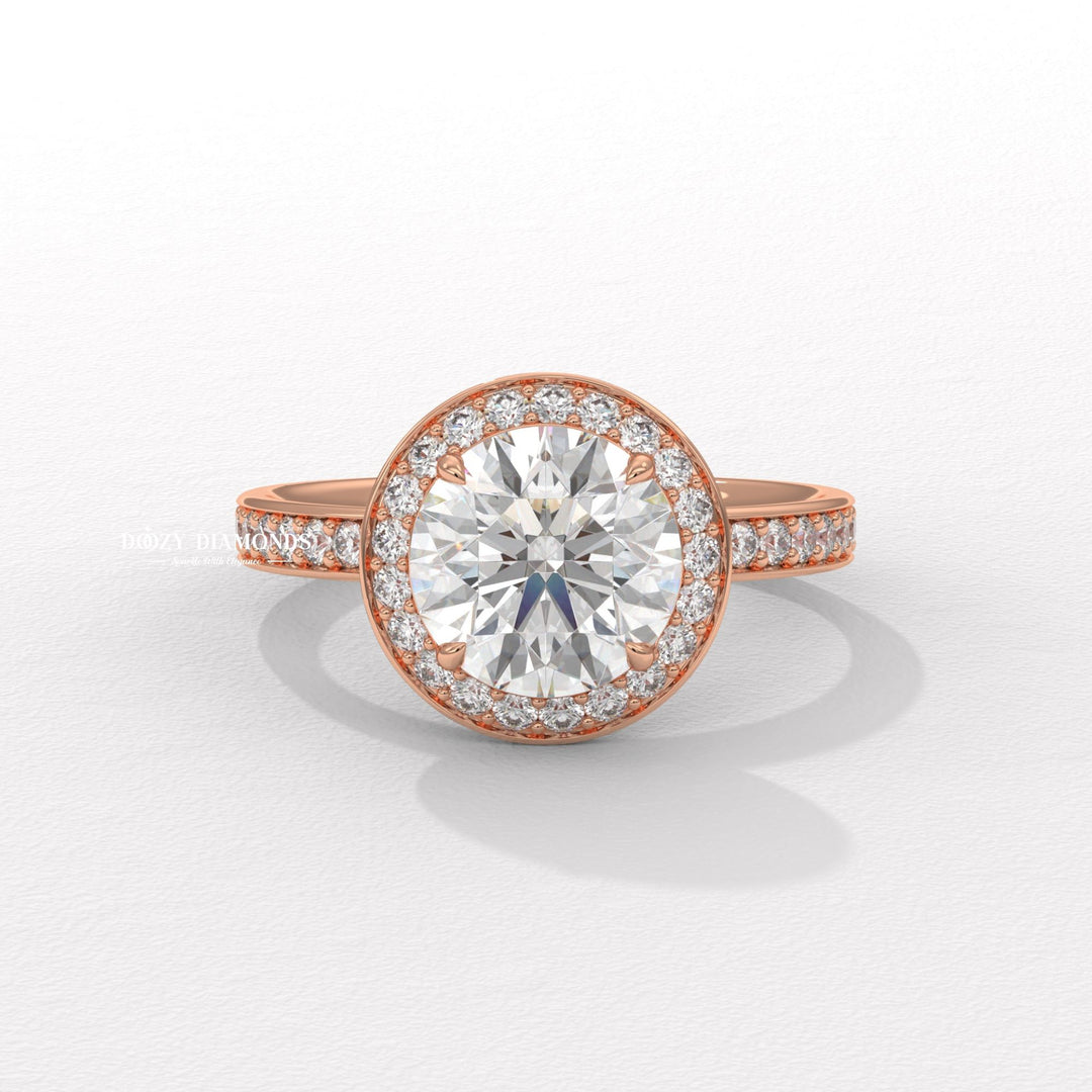 Macro shot of round cut diamond facets in halo ring setting