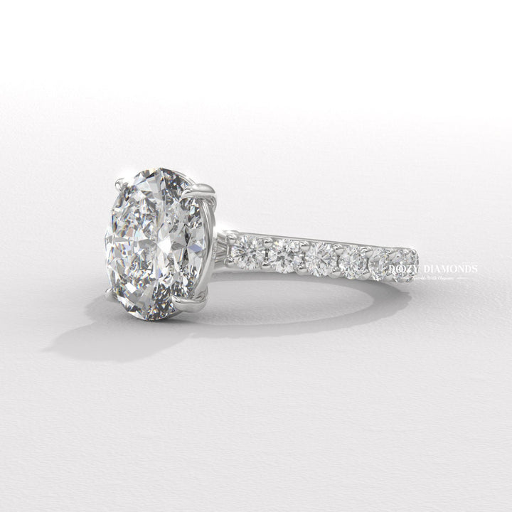 Oval pave lab grown diamond ring side profile in gold setting