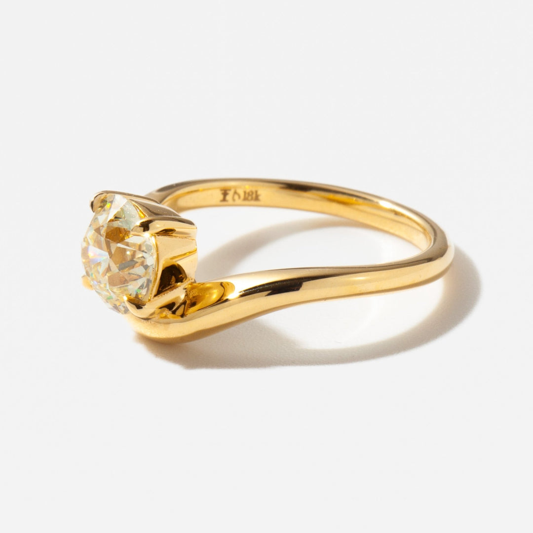 Premium round cut solitaire engagement ring crafted in solid gold